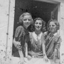 This photo was taken in the late 1930's in the area of Chust in Carpathia.It is a picture of Bailczu Kratz (killed in Auschwitz), sister Dori Kratz, and cousin Rifky Muller (also killed in Auschwitz).I do believe that the house is where the Muller's lived.