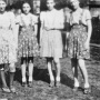 This is a photo of my Aunt Estie (Kratz) Appel in the village of Luh.This is from the late 1930's early 1940's.<br /><br />Standing from left to right:<br /><br />      Rubin        Bailczu Kratz         Rifka Lazarovitch            Estie Kratz